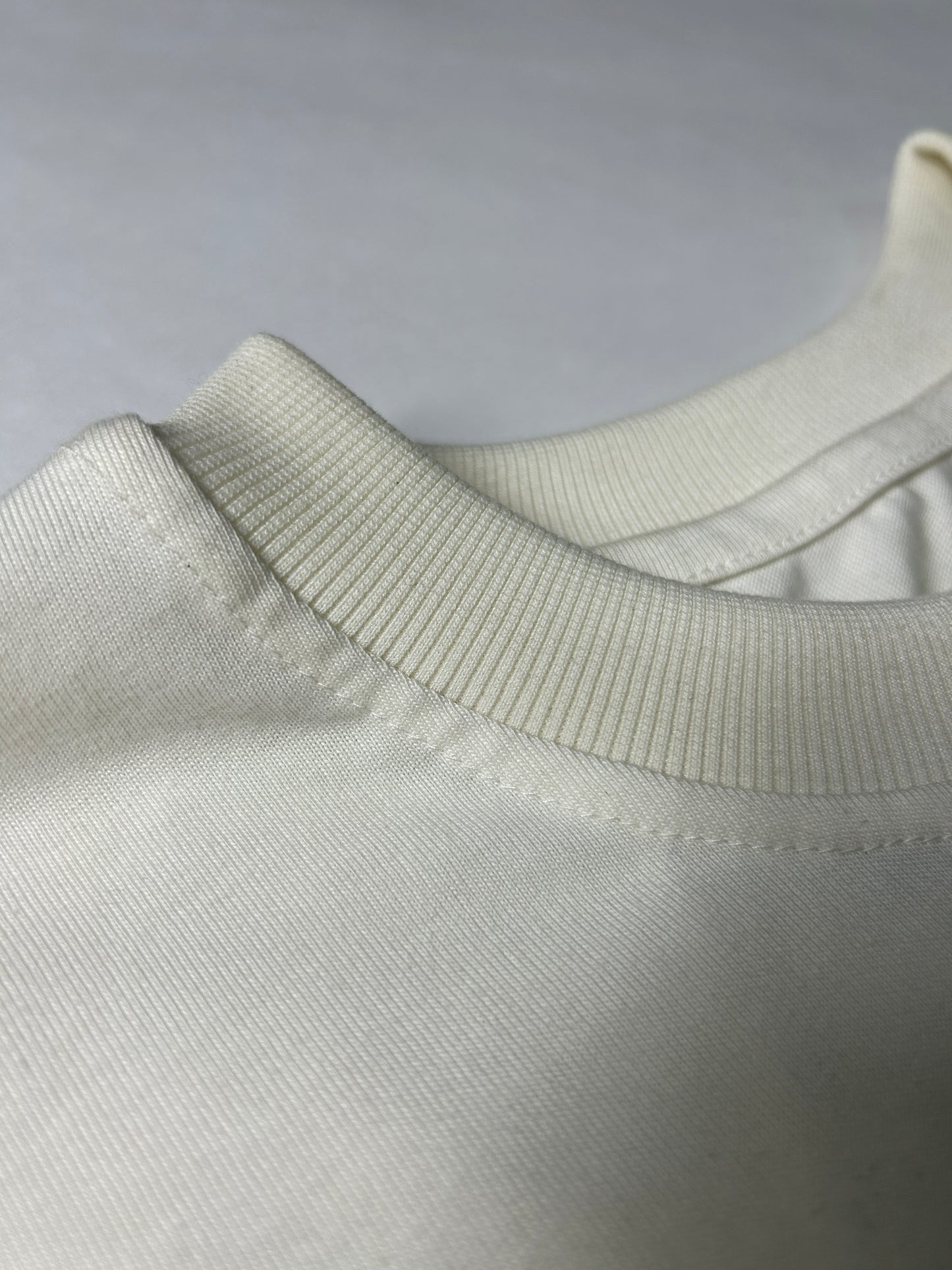 CAMISETA ESENCIAL MARFIL GX1.3