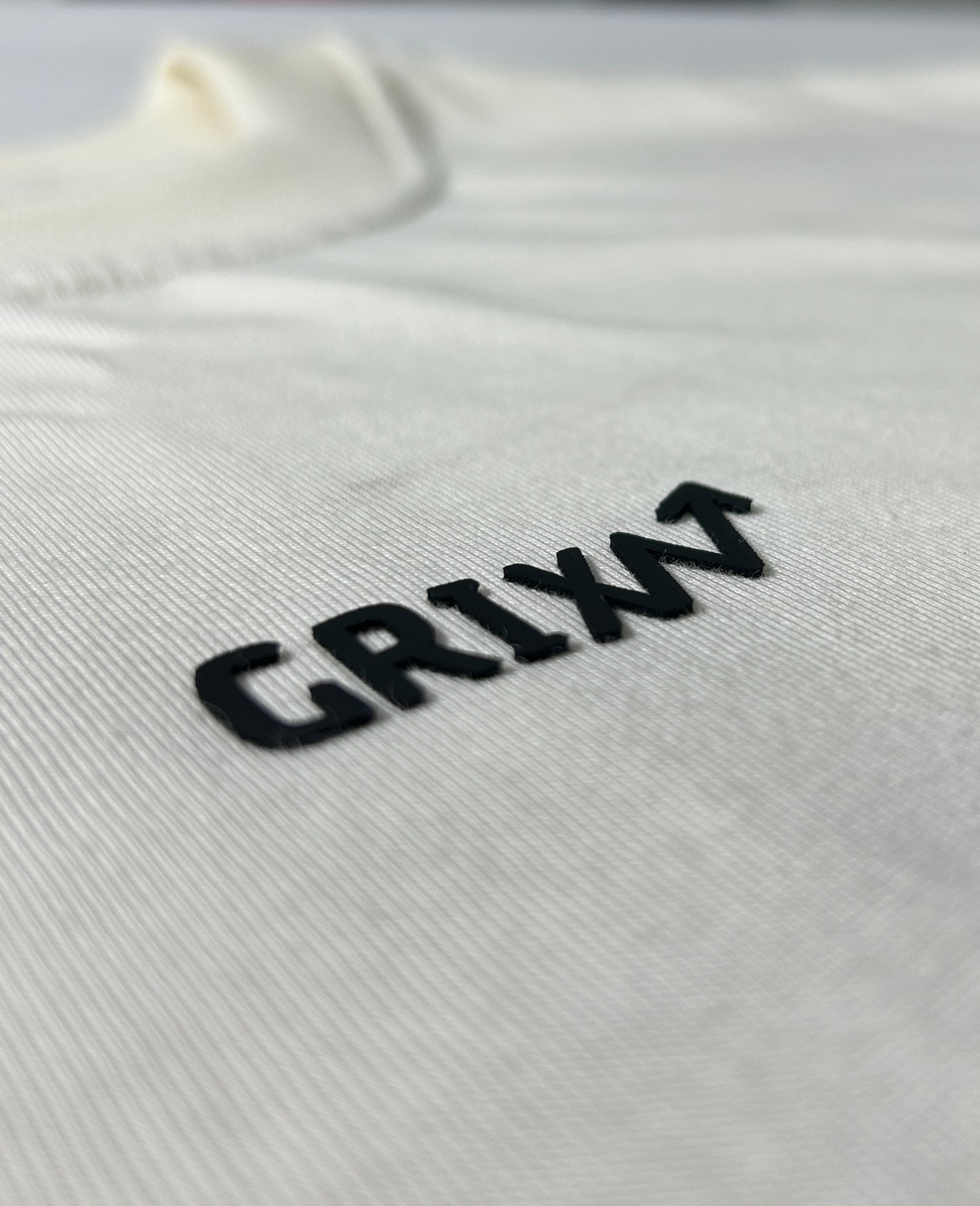 CAMISETA ESENCIAL MARFIL GX1.3