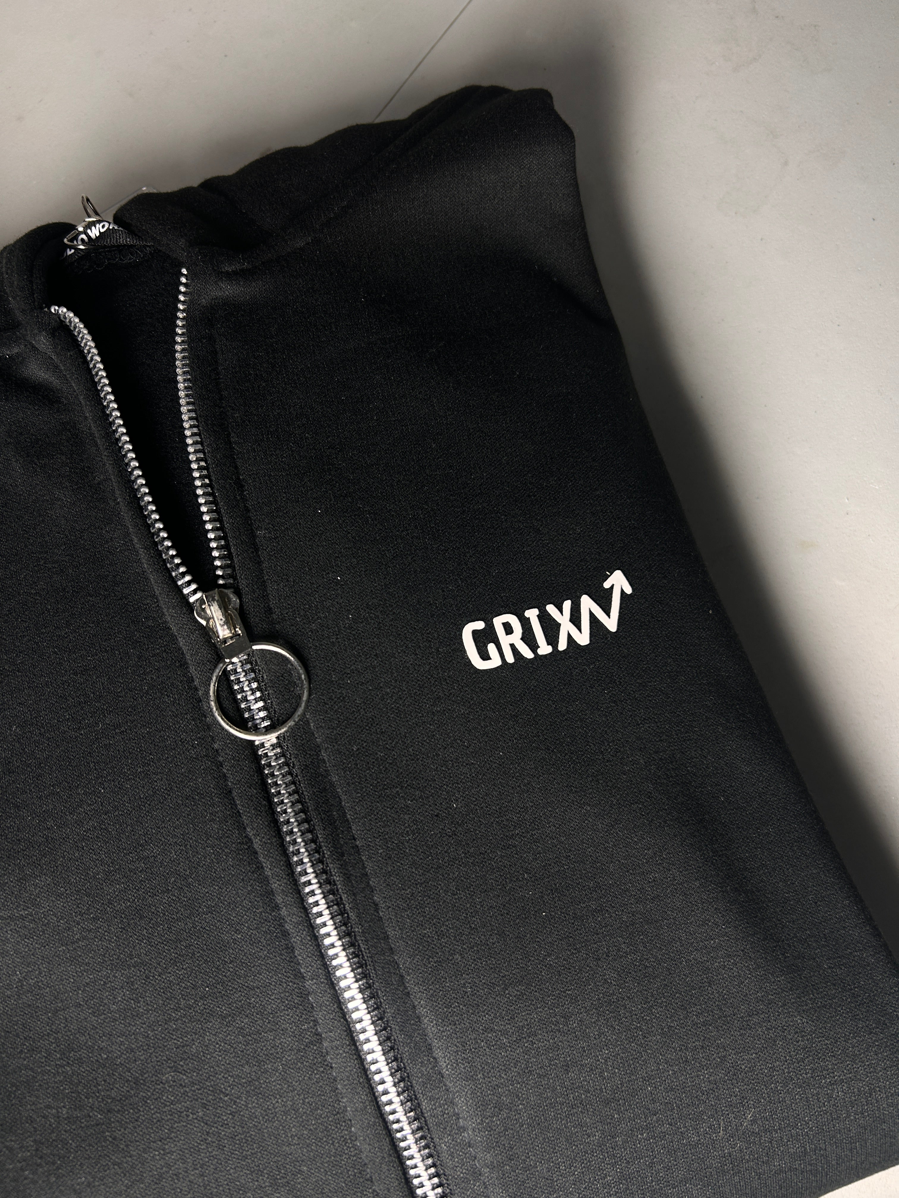 CHAQUETA ESENCIAL NEGRA GX6.2